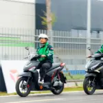 Grab Việt Nam hợp tác với Yadea Việt Nam hỗ trợ đối tác tài xế Grab chuyển đổi sang xe máy điện