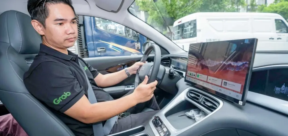 Grab Việt Nam và Tasco Auto hợp tác toàn diện giúp tài xế chuyển sang xe điện
