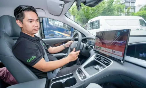 Grab Việt Nam và Tasco Auto hợp tác toàn diện giúp tài xế chuyển sang xe điện
