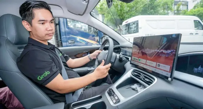 Grab Việt Nam và Tasco Auto hợp tác toàn diện giúp tài xế chuyển sang xe điện